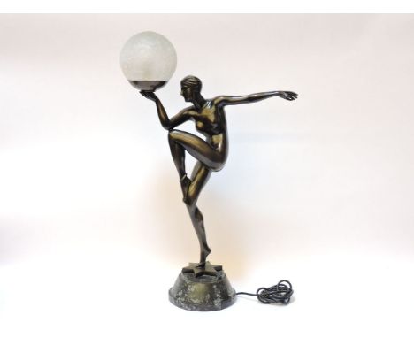 A reproduction Art Deco style figural table lamp, with glass shade, 71cm tall