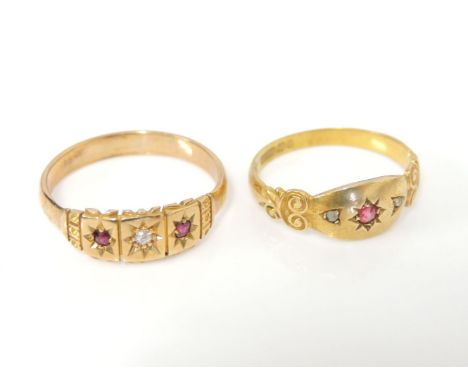 A Victorian 15ct gold ruby and diamond ring, size L½, and a Victorian 18ct gold diamond and ruby ring, size P