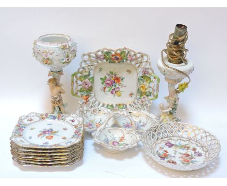 A collection of Dresden porcelain, including a pierced square bowl with applied flowers, 27cm, a nut dish, a further pierced 