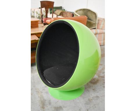A vintage Eero Aarnio designed Ball Chair in a lacquered lime green finish on a swivel base. H.120 x W.110 x D.85cm