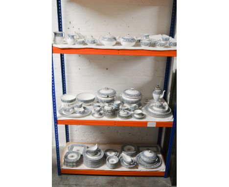 A large and extensive Wedgwood Turquoise Florentine pattern tea and dinner service including tea pot, coffee pot, gravy boats