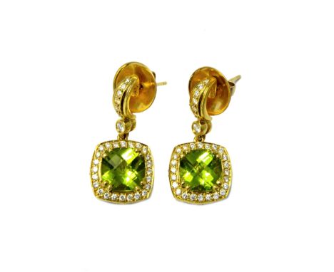 A pair of gold, peridot and diamond set pendant earrings, by Charles Krypell for Buchwald, each earring mounted with a cushio