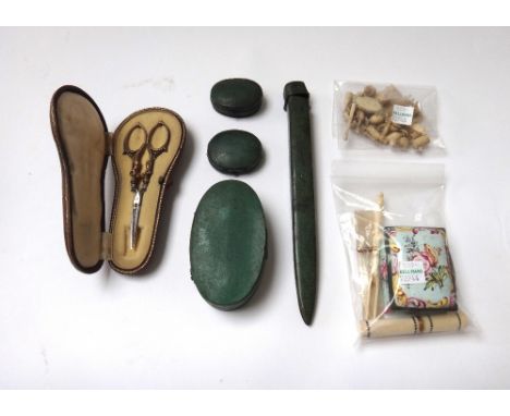 A small group of collectables, to include; an etui, an enamel pill box of casket form, a bone fork, a mother of pearl etui an