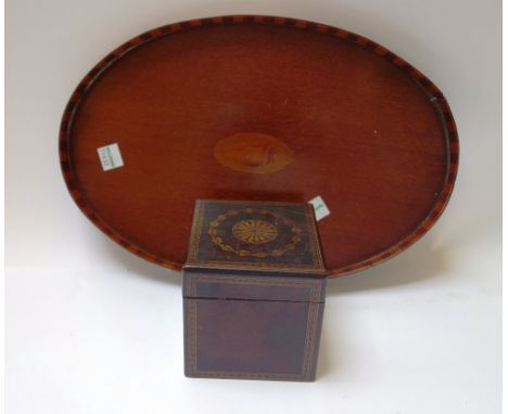 A 19th century inlaid mahogany cube form tea caddy, 9cm wide, together with a late 19th century galleried oval tray, with con