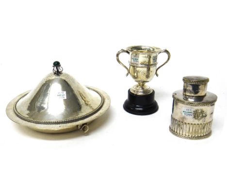 A silver twin handled trophy cup, Birmingham 1915, weight 101 gms, with a black stand and plated wares, comprising; a circula