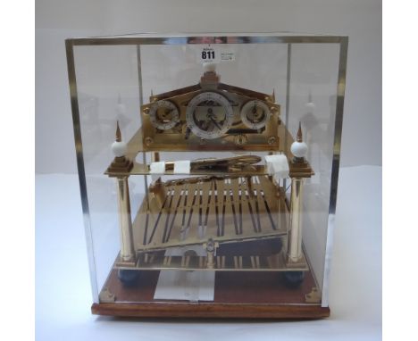 A reproduction William Congreve rolling ball clock, built circa 1980 by William R. Smith, Stanwick St John, with polished bra