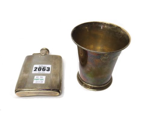 Silver, comprising; a rectangular spirit flask, having engine turned decoration, Birmingham 1948 and a beaker, of tapering cy