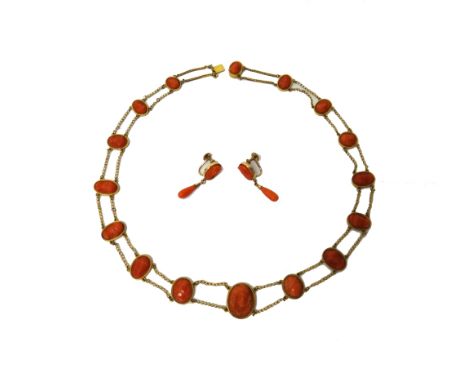 A gold and carved coral cameo necklace, formed as a row of graduated oval coral cameos, each carved as a classical bust, conn