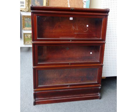 A 20th century mahogany Globe Wernicke three tier bookcase, 87cm wide.