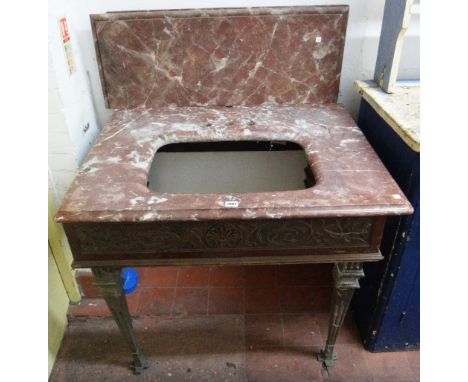 An early 20th century sink unit, with rouge marble splash back and surround, inset with a ceramic sink, by Doulton & Co Limit