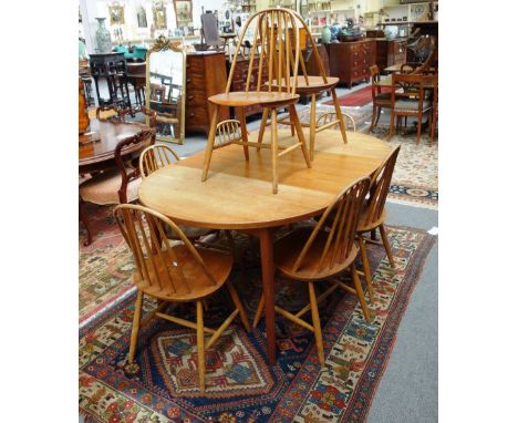 Haga Fors, Sweden; a set of eight mid 20th century beech and teak stick back dining chairs, together with a 20th century Nils