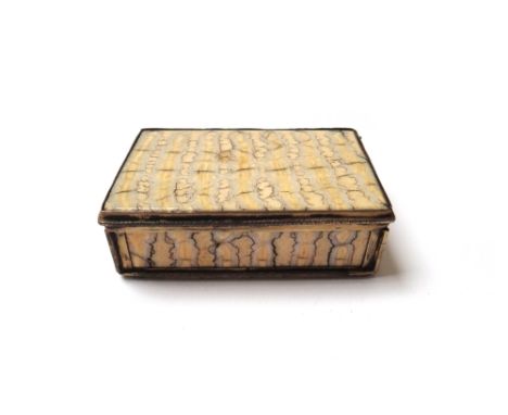 A silver-gilt mounted elephant's tooth snuff box, mid-19th century, of rectangular form, 9.3cm wide.
