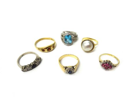 A white gold, diamond and sapphire set five stone ring, detailed 18 CT, a 9ct gold, sapphire and diamond set seven stone clus