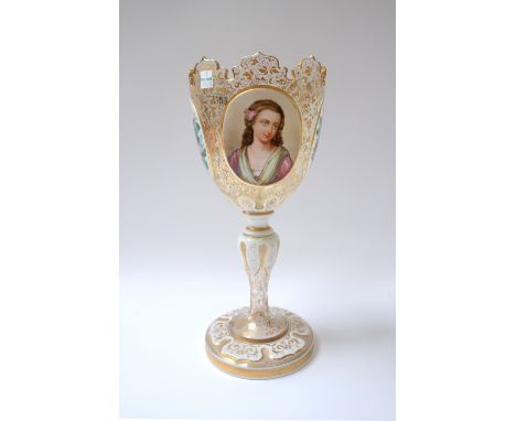 A large Bohemian glass goblet, late 19th century, overlaid in white and enamelled with two head and shoulder portrait panels 