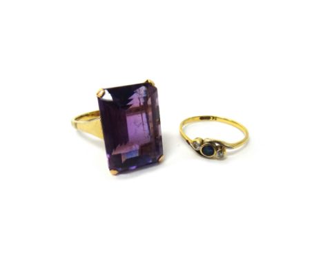 A gold ring, claw set with a cut cornered rectangular step cut amethyst, ring size N and a gold and platinum, sapphire and di