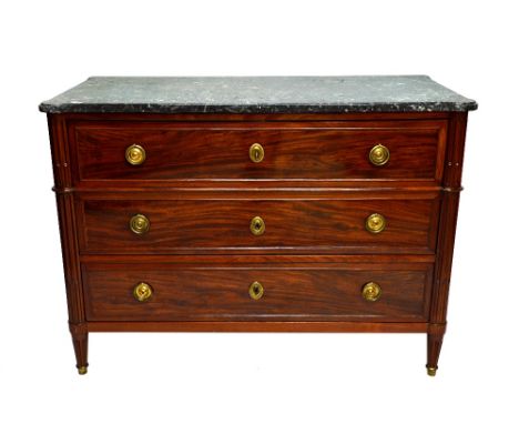 A late 18th century French secretaire commode, the black marble top over a later adapted secretaire drawer and two further dr