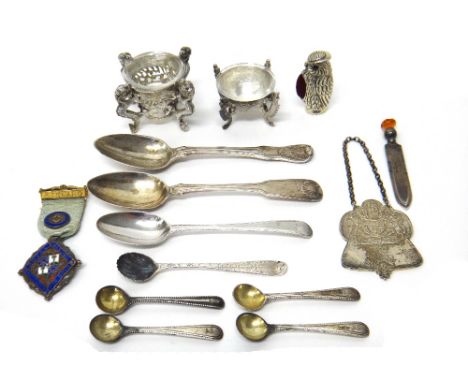 Silver, comprising; a set of four Victorian beaded pattern salt spoons, London 1864, a silver King's pattern teaspoon, a silv