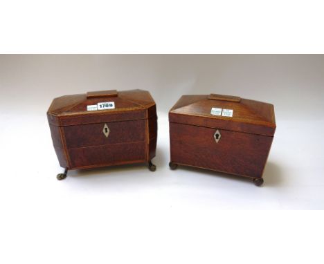 A Regency tulipwood banded burr yew sarcophagus tea caddy, with twin lidded interior, on gilt metal ball and claw feet, 22cm 