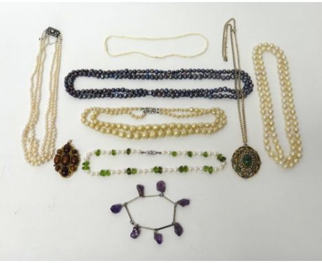 A three row necklace of graduated cultured pearls, on a rectangular colourless paste set clasp, five further necklaces, two c