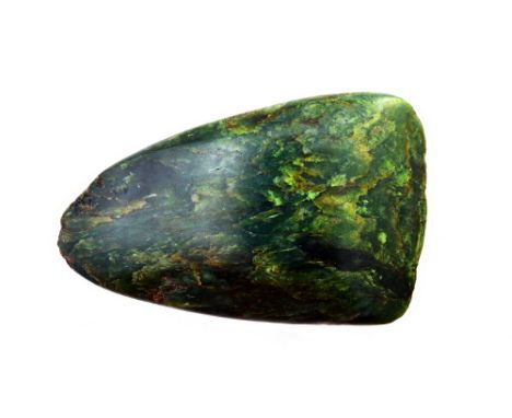 A carved green hardstone axe head, 13.5cm long.   Illustrated

