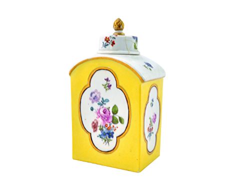 A Meissen yellow ground arched rectangular tea caddy and cover, mid 18th century, painted with quatrelobed panels enclosing f