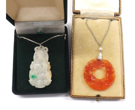 Chinese carved orange jade circular disc pendant, surmounted by a single cultured pearl on a slender white 9ct necklet, 7.4gm