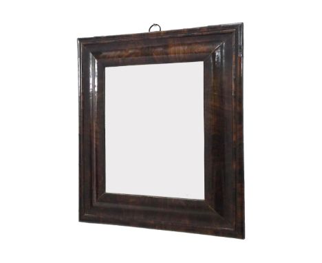 Early 19th century walnut mirror within a cushion frame, 23" high