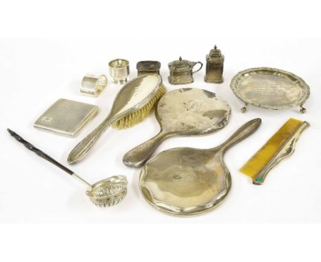 Mixed assorted silver items, to include a four piece part dressing table set, silver inscribed waiter, three piece condiment 