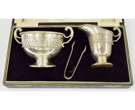 Cased twin-handled sucrier and matching cream jug, decorated with a knot design band, maker James Woods & Sons, Birmingham 19