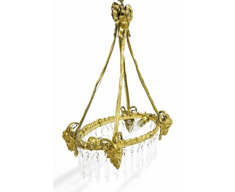 Gilt metal and glass crystal chandelier, the prism glass crystal drops around an oval frame of moulded flower heads with four