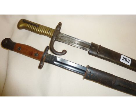 WW1 Lithgow SMLE bayonet and scabbard together with a 19th c. French bayonet with scabbard dated 1867