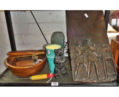 Shelf of treen and metalware, inc. corkscrew, Arts &amp; Crafts copper plaque depicting knights and lady on burning pyre, cas