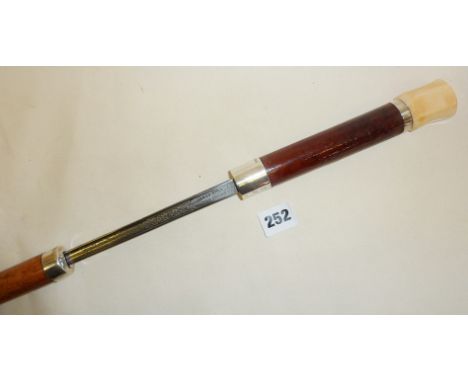 Victorian swordstick - malacca cane with silver bands and ivory knob. Blade marked as Wilkinson Pall Mall and James Smith, Ne