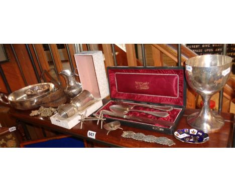 Shelf of silver plated items inc. jewellery, cutlery, knife rests, goblet, etc.