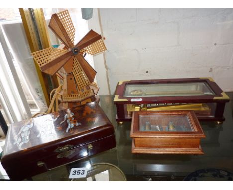 A Jobin glass cased musical box playing 3 airs, a smaller similar, an Oriental lacquer box and a kitsch musical windmill beds