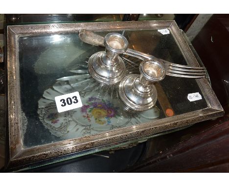 Glass tray with hallmarked silver rim and feet, silver cutlery and candlestick pair