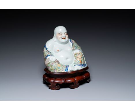 Full title: A Chinese famille rose Buddha figure on wooden stand, Wei Hongtai é­æ´ªæ³° seal mark, 19/20th C.Description:H.: 2