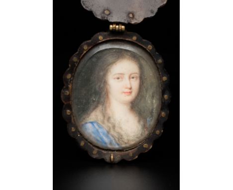Full title: French school: a miniature lady's portrait, gouache on paper, mounted in a tortoise shell frame, 19th C.Descripti