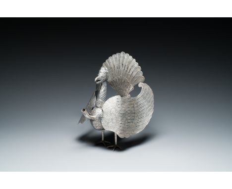 Full title: A rare Indonesian silver 'Garuda' oil lamp for the Wayang theatre, 'blencong', 19th C.Description:H.: 41 cm Prove