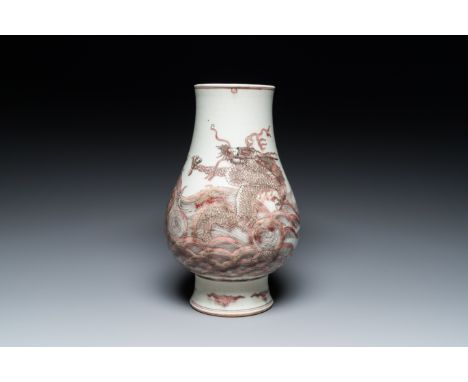 Full title: A Chinese copper-red 'dragon and carp' vase, Kangxi mark, 20th C.Description:H.: 30 cm Provenance:- The collectio