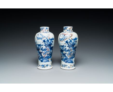 Full title: A pair of Chinese blue, white and copper-red vases, Kangxi mark, 19th C.Description:H.: 22 cmCondition reports:Co