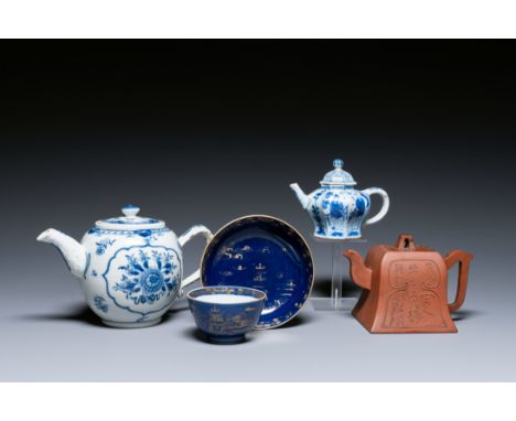 Full title: Two Chinese blue and white teapots, one in Yixing stoneware and a powder-blue cup and saucer, Kangxi and laterDes