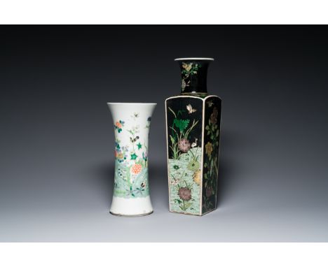 Full title: A square Chinese famille noire vase and a famille verte 'gu' vase, Kangxi mark, 19th C.Description:H.: 50 cm (the