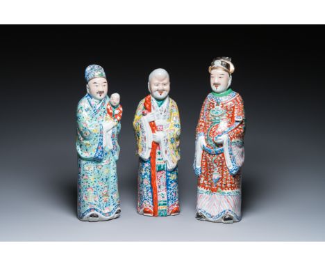 Full title: Three Chinese famille rose figures of star gods, seal marks, 19/20th C.Description:H.: 49 cm (the tallest)Conditi