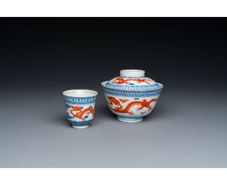 Full title: A Chinese blue, white and iron-red 'dragon' bowl and cover and a wine cup, Qianlong mark, 18/19th C.Description:D