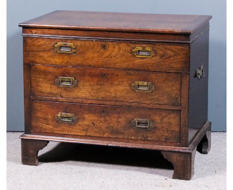 A 19th Century mahogany military style chest, the lifting top opening to reveal lift-out tray, fitted fifteen niches, two dra
