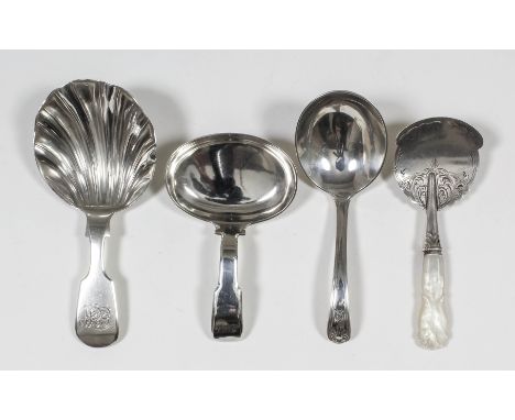 A Victorian silver fiddle pattern caddy spoon with shell pattern bowl by Thomas Sewell, Newcastle 1869 (weight 15.5 grammes -