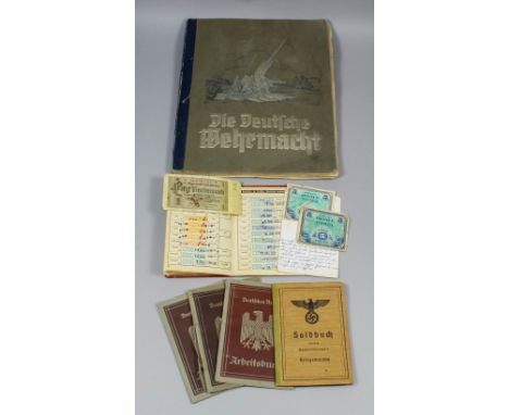 Three German Employment Identification Documents (Deutsches Reich Arbeitsbuch - First Style), a German pay book (Soldbuch), a