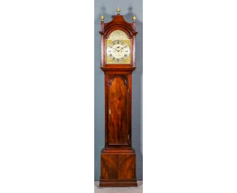 An 18th Century mahogany longcase clock by William Carter of Hampstead, the 12ins arched silvered dial with raised silvered c