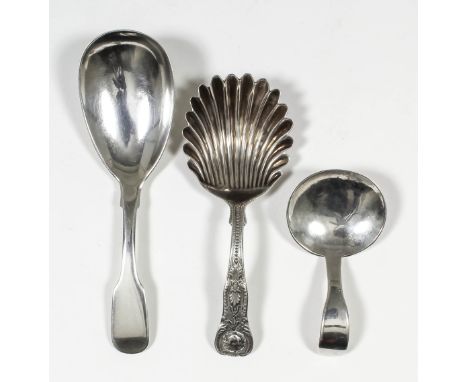 A George III plain silver fiddle pattern caddy spoon with oval bowl by George Nangle, Dublin 1810 (weight 24 grammes), a Will